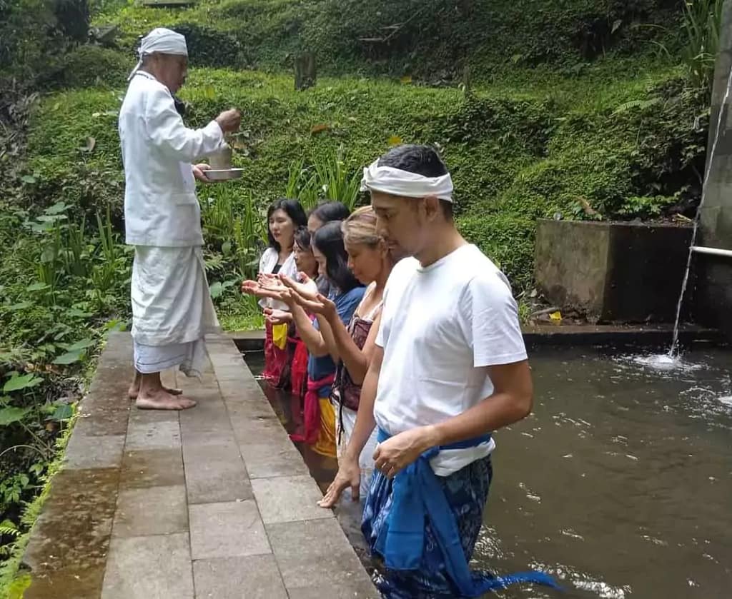 melukat at Jagasatru waterfall karangasem