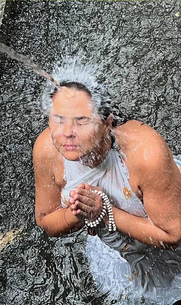 Tourist melukat at Jagasatru Waterfall karangasem with 3 holy water