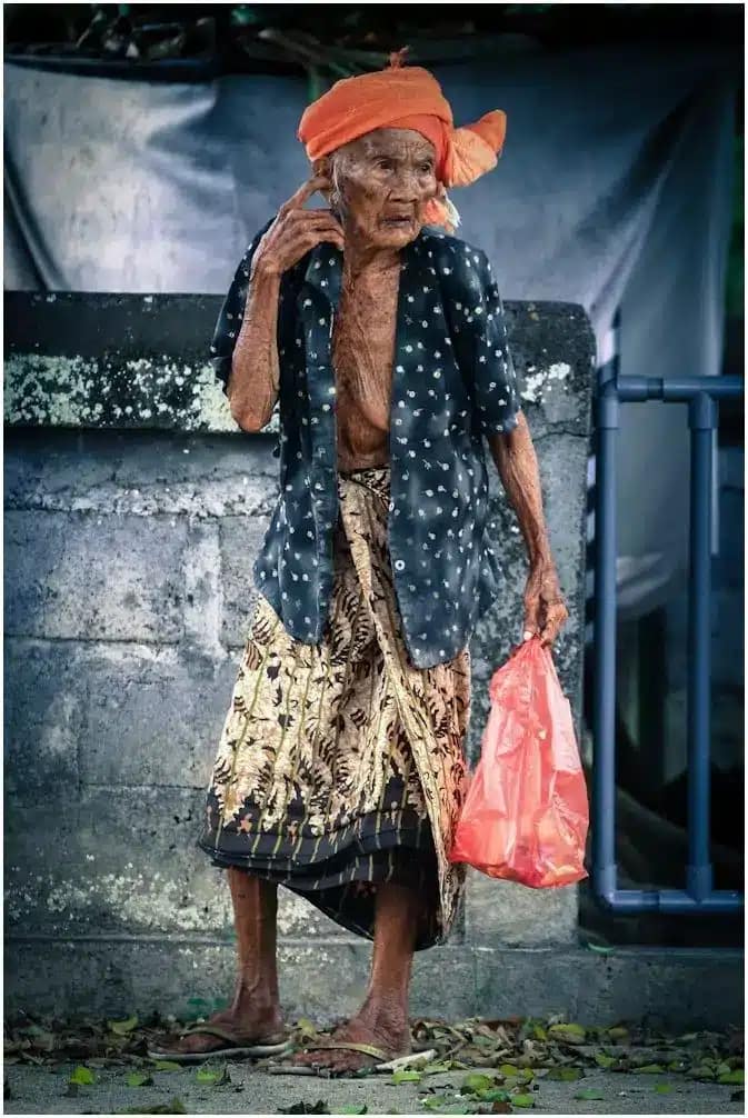 Things to Avoid in Bali - a Balinese grandmother is glancing
