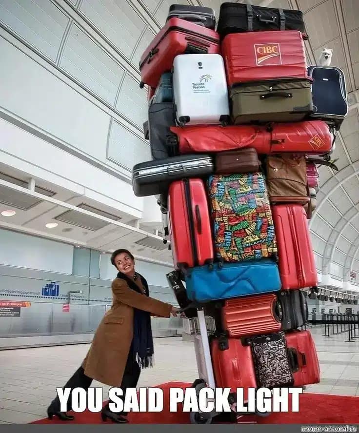 Luggage Storage In Uluwatu - 
A woman pushing a trolley full of suitcases is the paradox of travel light. The importance of considering using Bali transfer luggage service.