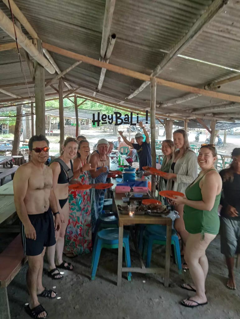 Hey Bali guests enjoying lunch at Tangsi Lombok Beach or pink beach 1 and seem to really enjoy the grilled fish menu provided.