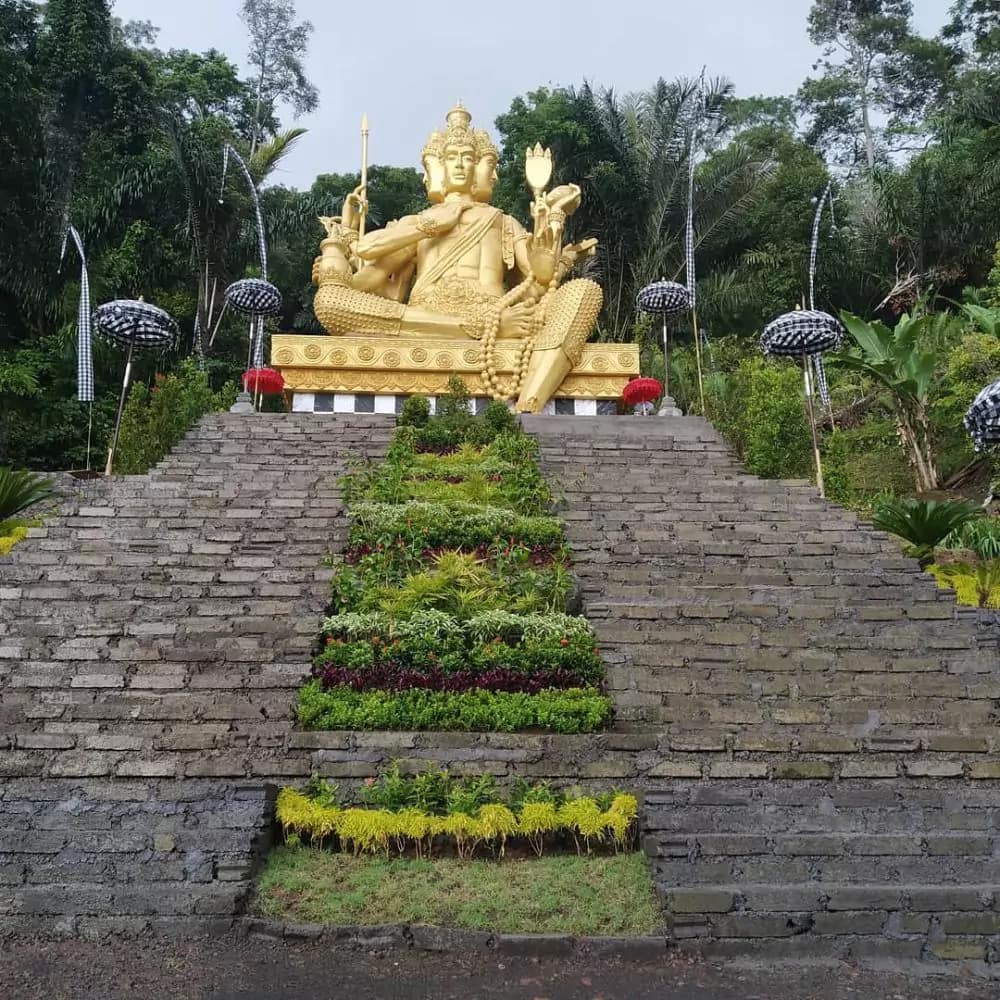 Giant Brahma statue at Jagasatru waterfall Karangasem
